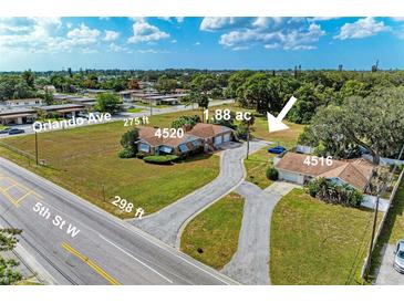 Aerial view of two properties and surrounding neighborhood at 4520 5Th W St, Bradenton, FL 34207