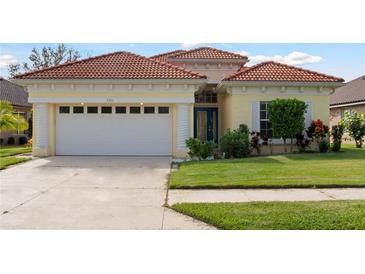 One-story house with tile roof and two-car garage at 5301 Laurel Oak Ct, North Port, FL 34287