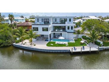 Luxury waterfront home with private pool and dock at 111 Gull Dr, Anna Maria, FL 34216