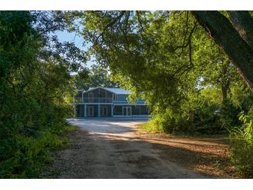Private home nestled amongst lush landscaping at 655 N Clermont Rd, Venice, FL 34292