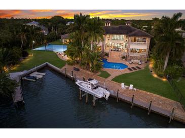 Luxury waterfront home with pool and boat lift at 3544 San Remo Ter, Sarasota, FL 34239