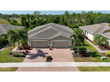 Aerial view of a two-car garage home at 13458 Abercrombie Dr, Englewood, FL 34223