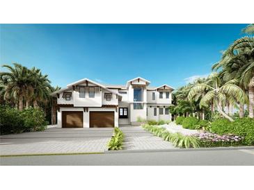 Stunning two-story home with a double garage and manicured landscaping at 4544 Woodside Rd, Sarasota, FL 34242