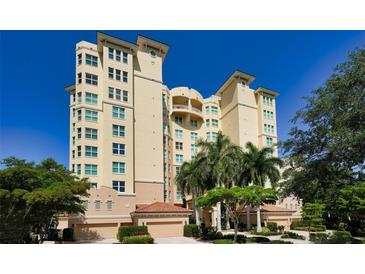 Luxury condominium building with ample parking at 409 N Point Rd # 501, Osprey, FL 34229