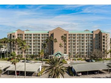 Condo building with parking and tropical landscaping at 2320 Terra Ceia Bay Blvd # 203, Palmetto, FL 34221