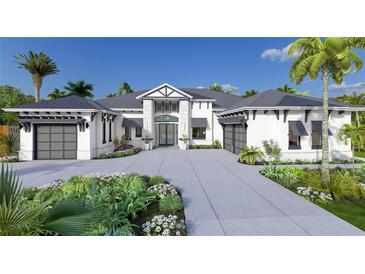 Stunning two-story home with a modern design and attractive landscaping at 1800 Webber St, Sarasota, FL 34239