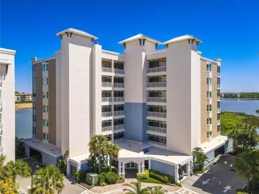 Luxury condo building with lake views and parking at 10520 Boardwalk Loop # 302, Bradenton, FL 34202