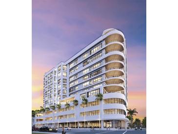 Modern building exterior with balconies and street-level shops at 290 Cocoanut Ave # Ph C, Sarasota, FL 34236
