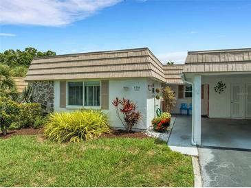 Quaint condo with carport and landscaping at 2323 Waterbluff Pl # V314, Sarasota, FL 34231