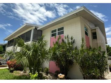 Two-story building with pink accents at 2501 Beneva Rd # 8, Sarasota, FL 34232