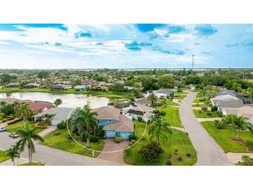 Bird's eye view of a waterfront home in a residential area at 8607 51St W Ave, Bradenton, FL 34210