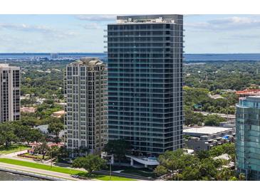 Luxury high-rise building with modern architecture and water views at 2912 W Santiago St # 2004, Tampa, FL 33629