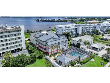 Waterfront condo building with private balconies at 1477 Park Beach Cir # 13, Punta Gorda, FL 33950
