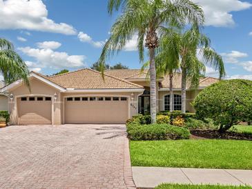 Beautiful home with 2-car garage and lush landscaping at 6747 Coyote Ridge Ct, Bradenton, FL 34201