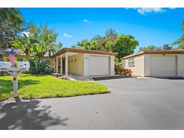 Attractive exterior of a condo with a carport at 2310 Lark Ln # 22, Sarasota, FL 34231