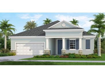 One-story home with a two-car garage and landscaping at 10031 Cross River Trl, Parrish, FL 34219