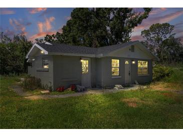 Charming single-story home with a well-maintained yard, neutral paint, and inviting curb appeal at 105 2Nd Se Ave, Ruskin, FL 33570