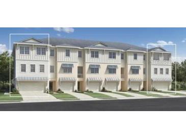 Modern townhouses with attached garages at 9947 Key Haven Rd, Seminole, FL 33777