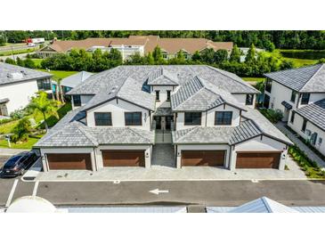 Aerial view of a modern townhome community at 5707 N Honore Ave # 621, Sarasota, FL 34243