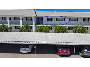 Building exterior showing a condo unit and parking at 4819 Independence Dr # 4819, Bradenton, FL 34210
