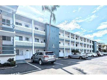 Two-story apartment building with ample parking in front at 5933 17Th W St # A24, Bradenton, FL 34207