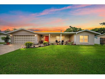 Ranch style home with a covered porch at 2611 Sunnyside St, Sarasota, FL 34239