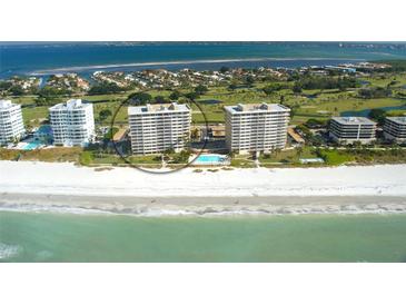 Aerial view of beachfront condo building with pool and ocean views at 603 Longboat Club Rd # 602N, Longboat Key, FL 34228