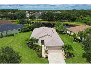 Single story home on a corner lot with mature landscaping at 12271 Lavender Loop, Bradenton, FL 34212