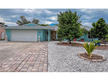 Charming single-Gathering home with a well-maintained front yard and paver driveway at 6401 36Th W Ave, Bradenton, FL 34209