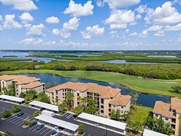 Luxury condos with lake and golf course views at 7019 River Hammock Dr # 401, Bradenton, FL 34212