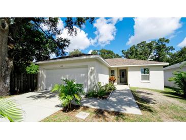 Charming one-story home with a two-car garage at 823 32Nd E Ave, Bradenton, FL 34208