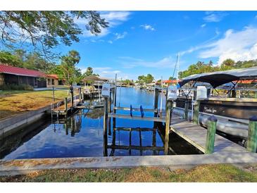 Private boat docks providing convenient access to the waterway at 9612 Valencia Cv, Bradenton, FL 34210