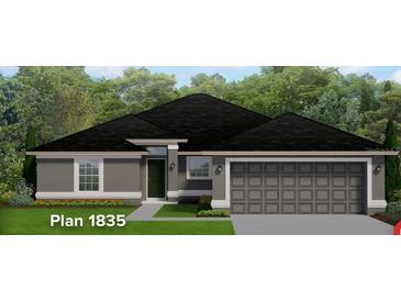 One-story house with gray exterior and two-car garage at 4784 Badosa Rd, North Port, FL 34286