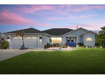 Charming single-story home with landscaped yard and basketball hoop at 5819 2Nd Avenue Nw Dr, Bradenton, FL 34209