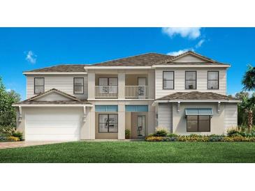 Two-story home with light beige siding and a gray roof at 2477 Waterfront Cir, Sarasota, FL 34240