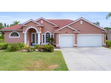 Single-Gathering home with three car garage at 7341 Featherstone Blvd, Sarasota, FL 34238