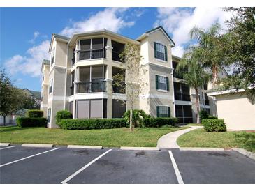 Three-story building with balconies and landscaping at 5122 Northridge Rd # 207, Sarasota, FL 34238