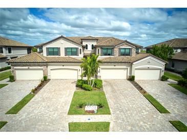 Luxury three-unit building with attached garages at 17825 Gawthrop Dr # 103, Bradenton, FL 34211