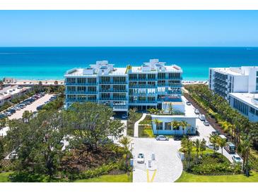 Modern beachfront building with ocean views at 4651 Gulf Of Mexico Dr # 402, Longboat Key, FL 34228
