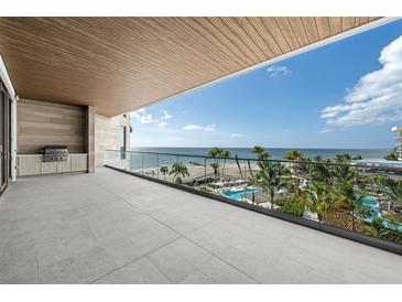 Spacious balcony with ocean view and grilling station at 1561 Gulf Of Mexico Dr # 403, Longboat Key, FL 34228