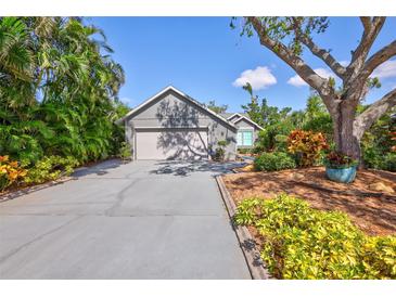 Charming house with a two-car garage and landscaped yard at 1775 Southwood St, Sarasota, FL 34231