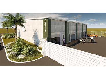 Modern garage building with multiple units and parking at 3866 Clover Ln, Sarasota, FL 34233
