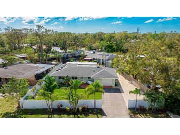 Aerial view of a single Gathering home with a large yard at 4817 Sarasota Ave, Sarasota, FL 34234
