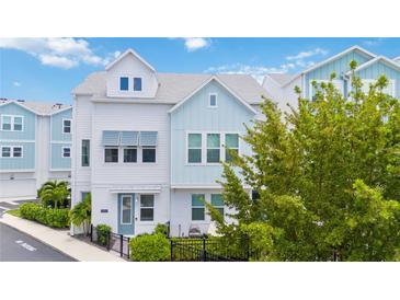 Two-story home with light blue and white siding at 2344 Lindstrom St, Sarasota, FL 34237