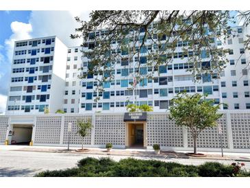 Gulfstream Towers building exterior with parking at 33 S Gulfstream Ave # 307, Sarasota, FL 34236
