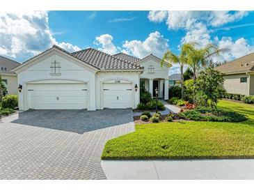 Beautiful two-story house with a three car garage at 1049 River Wind Cir, Bradenton, FL 34212