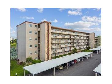 Multi-story apartment building with covered parking at 3820 Ironwood Ln # 106-I, Bradenton, FL 34209
