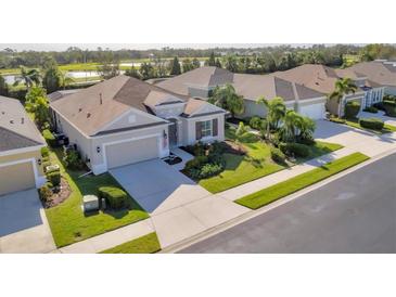 Attractive home with landscaped yard and two-car garage in a quiet community at 12706 Lake Silver Ave, Bradenton, FL 34211