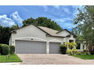 Two-story house with a two-car garage and well-maintained landscaping at 2271 50Th Street E Cir, Palmetto, FL 34221