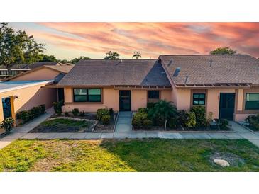 Charming single-story home featuring well-maintained landscaping and inviting front entrance at 2812 Heritage Ln # 2812, Bradenton, FL 34209